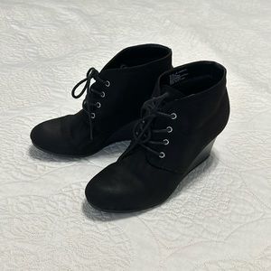 Black wedge heel boots